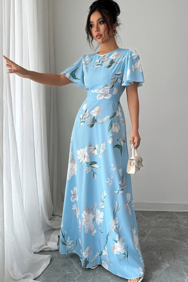 Vintage-inspired women's midi dress, pleated with a charming floral pattern.