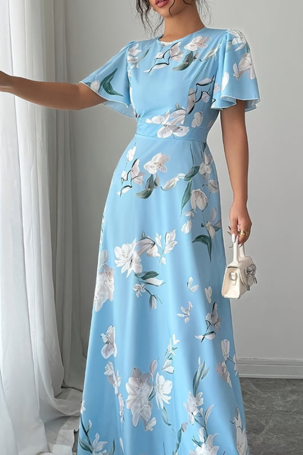 Women's casual flowy midi dress, featuring a lovely retro floral print and pleats.