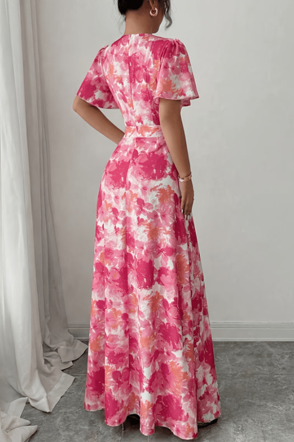 Elegant women's party dress, retro floral and pleated midi style for a chic look.
