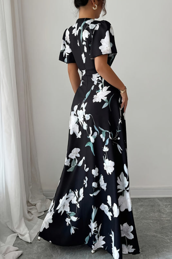 Summer ready pleated midi dress for women, featuring a vibrant retro floral print.
