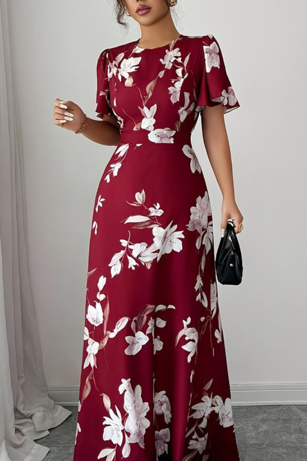 Women's elegant spring midi dress, retro style with floral print and beautiful pleats.
