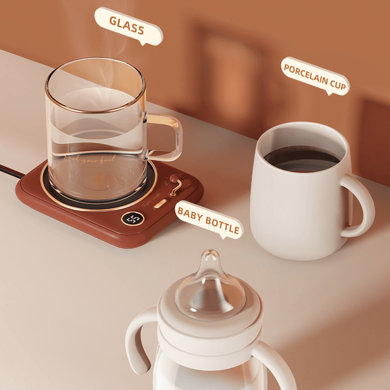 Compact USB mug warmer in white, warming a tea cup on a modern desk, perfect for home or office.
