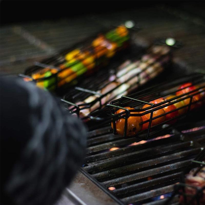 Durable, reusable grill kabob baskets for delicious barbecue and outdoor cooking, a must-have camping accessory.