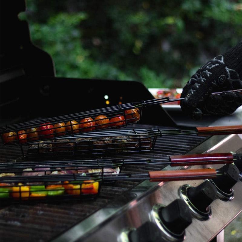 Package of two reusable grill kabob baskets, an essential outdoor cooking accessory for barbecue enthusiasts.