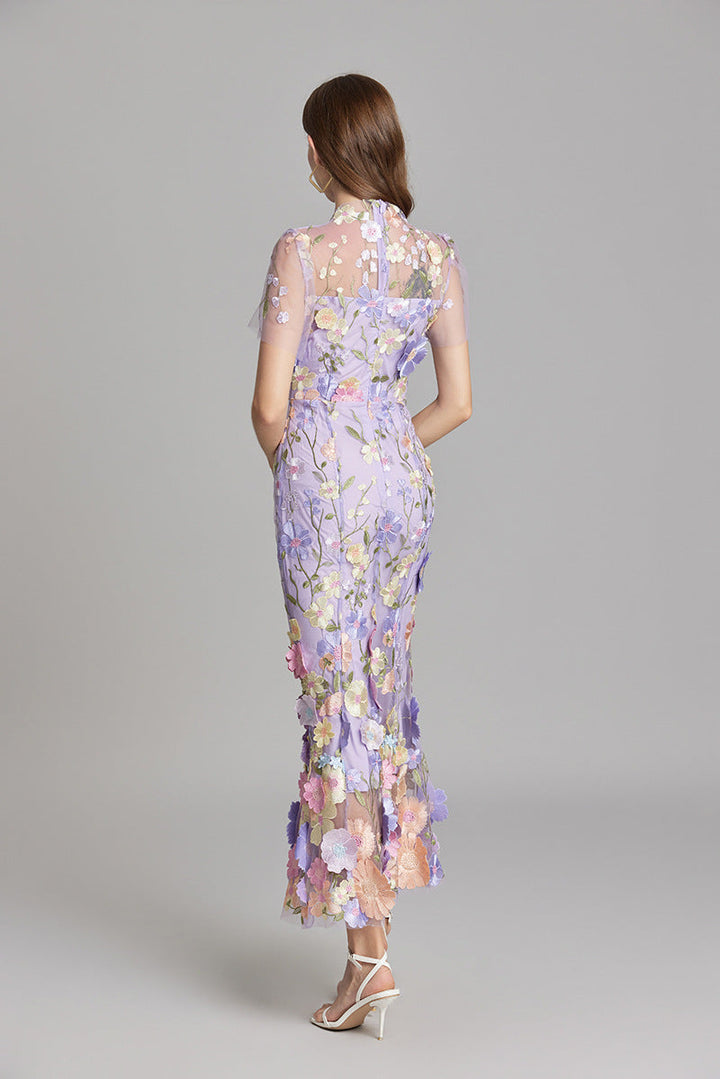 Elegant women's formal gown, mermaid silhouette, romantic floral details.