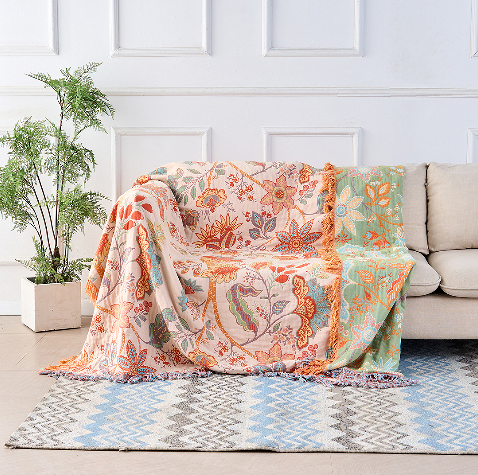 Rustic floral boho cotton blanket, soft and cozy for living room decor.