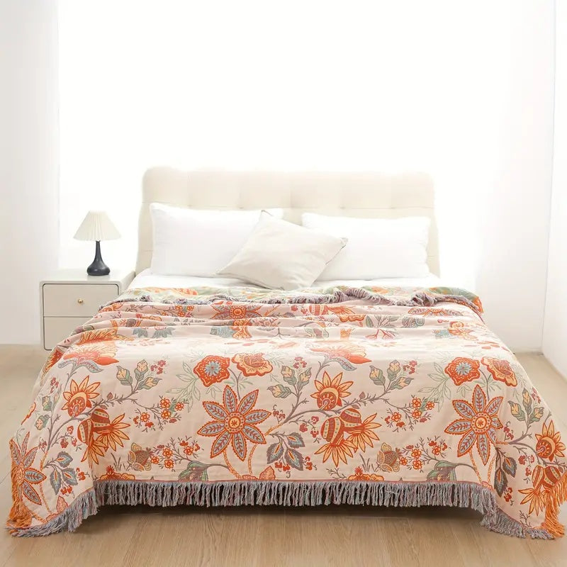Cozy rustic floral cotton throw, perfect for bohemian living room decor.