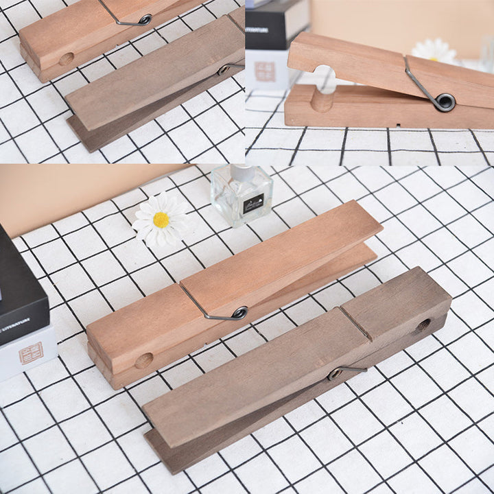 Laundry room towel holder, rustic wooden clothespin style, adds charm and organization.