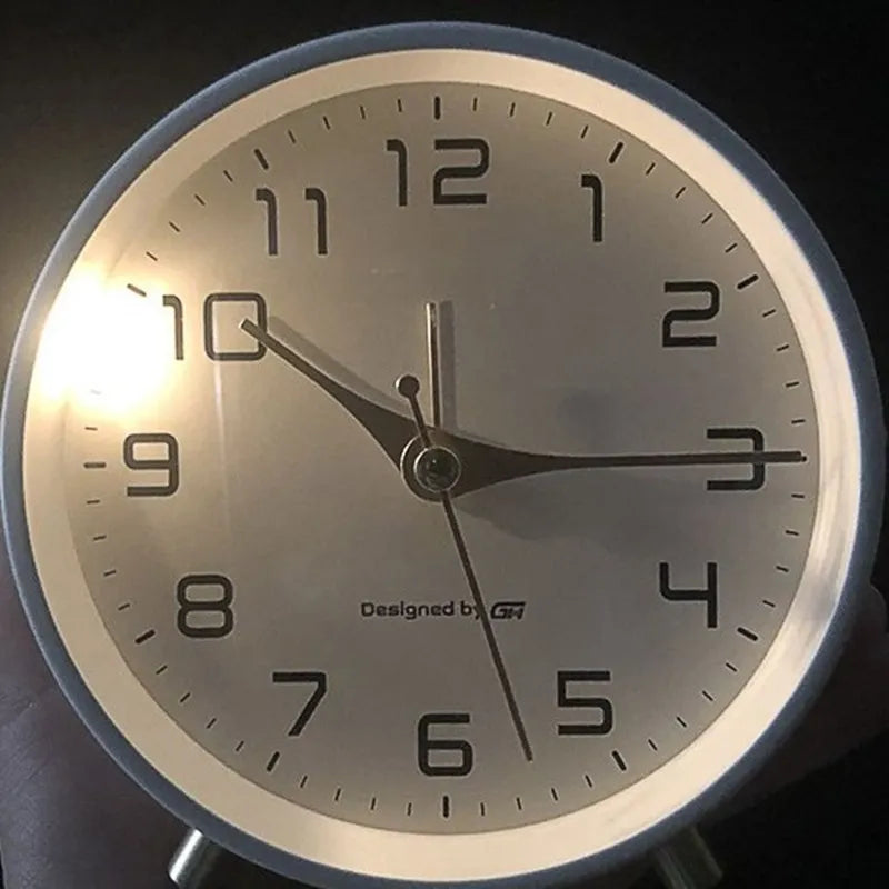 Minimalist Scandinavian silent table clock for modern home decor. Stylish desk or entryway accent, contemporary office clock.