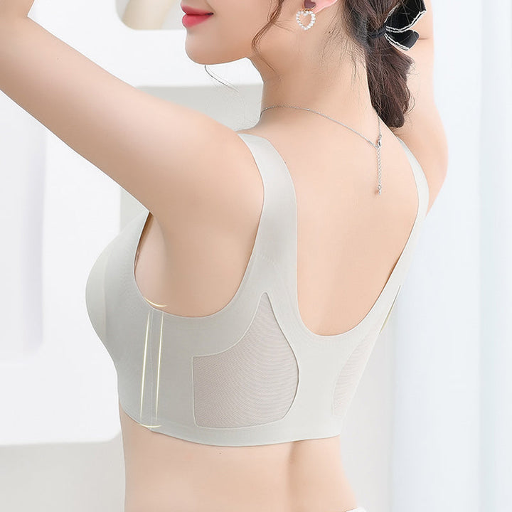 Moisture-wicking seamless wireless bra in a neutral tone, providing comfort and dryness for women