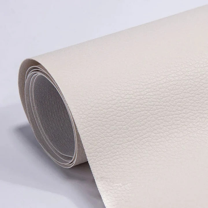 Upholstery repair tape: self-adhesive faux leather for sofas, recliners & car seats.