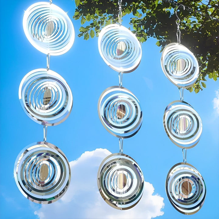 Set of 3 reflective bird deterrent spinners for garden protection. Stainless steel, wind-powered visual pest control.