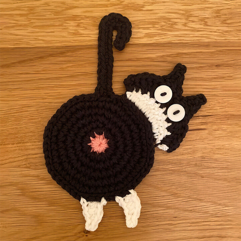 Humorous cat butt coaster made from cotton, great for protecting surfaces and sparking conversations.