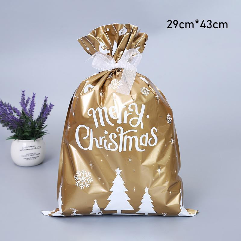 Empty reusable Christmas gift bag with an open drawstring, ready to be filled with holiday presents, festive wrapping