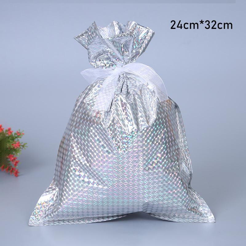 Group of friends exchanging gifts wrapped in festive reusable Christmas drawstring bags at a holiday party