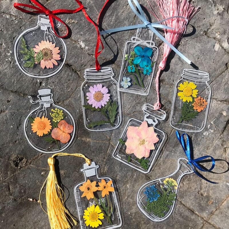 Transparent bookmark set for avid readers, each embedded with natural dried flowers & botanical elements.