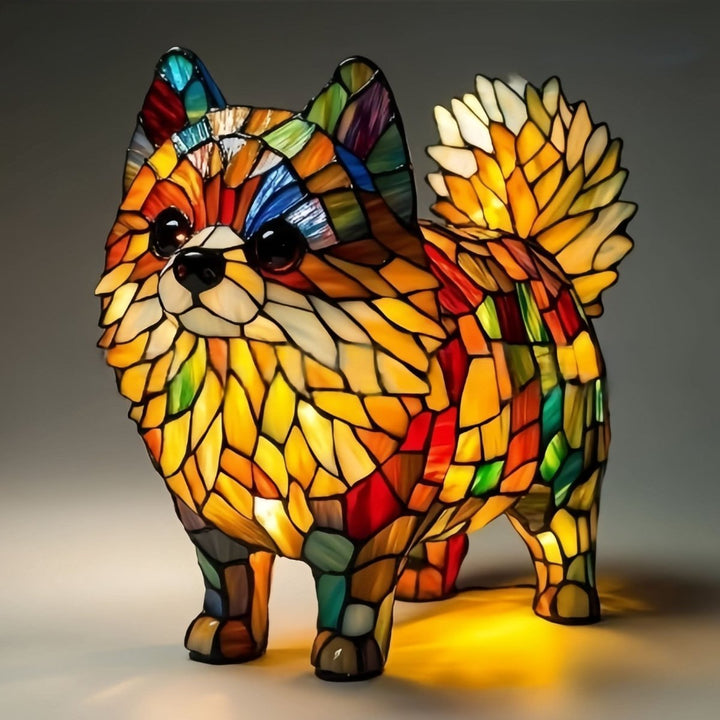Shimmering LED dog desk lamp, a unique animal figurine providing soft illumination.