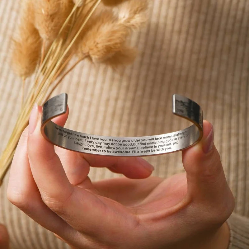 Shiny stainless steel cuff bracelet for granddaughter with engraved love message, top view