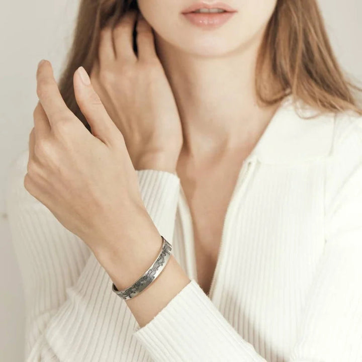 Stylish granddaughter cuff bracelet, showcasing the smooth polished finish and engraving