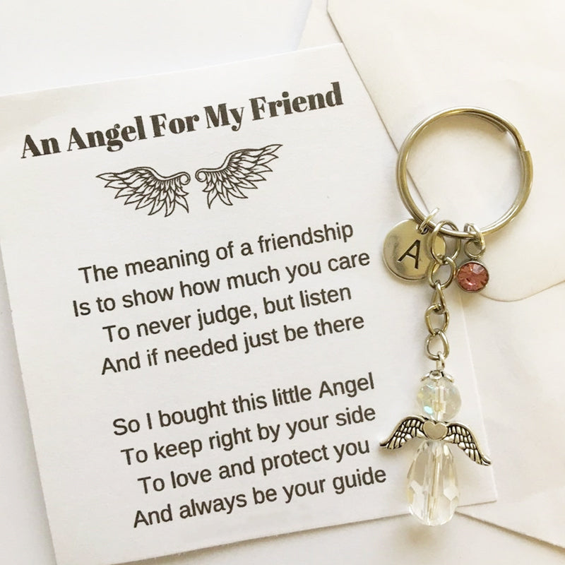 Elegant guardian angel keychain, silver-toned alloy charm for bags, a thoughtful spiritual gift.