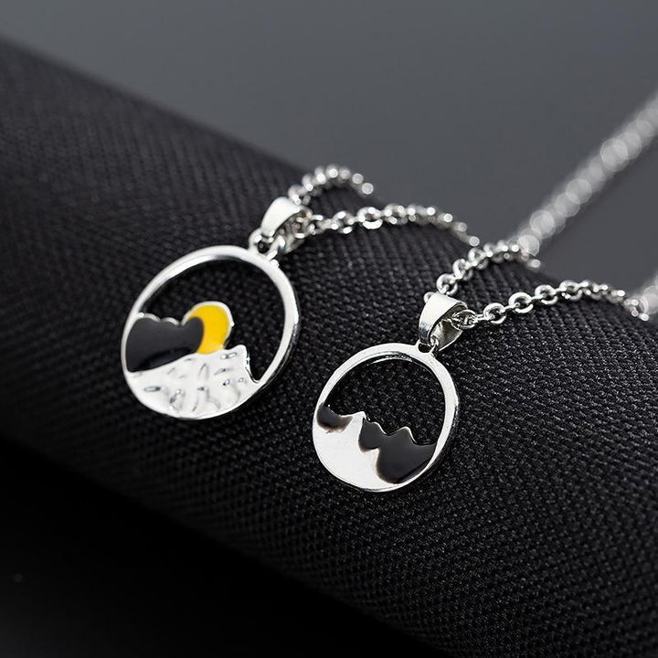 Couple's outdoor adventure mountain necklace in durable silver alloy, unisex and stylish.