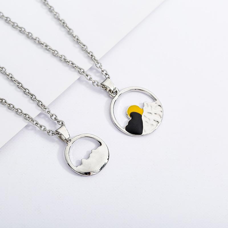 Matching set of silver mountain necklaces, a thoughtful gift for couples who enjoy the wilderness.