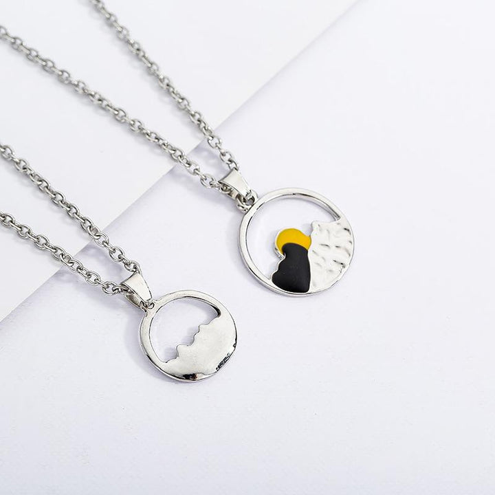 Matching set of silver mountain necklaces, a thoughtful gift for couples who enjoy the wilderness.