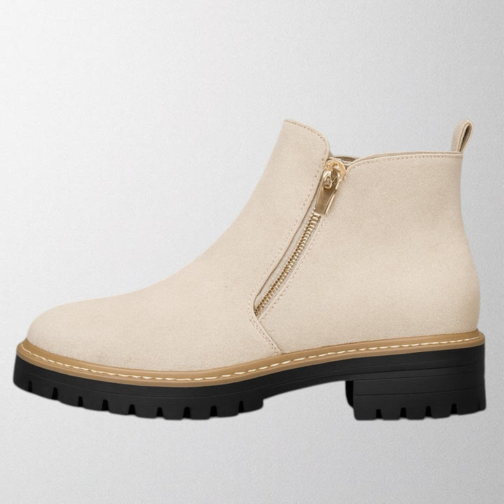 Fashionable women's round toe dress shoes featuring a sleek design and practical side zip closure.