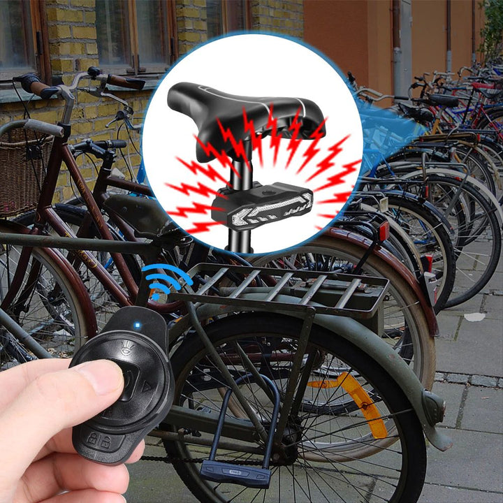 Ultra-bright smart LED bicycle rear light with anti-theft alarm. Waterproof, USB rechargeable for clear visibility.