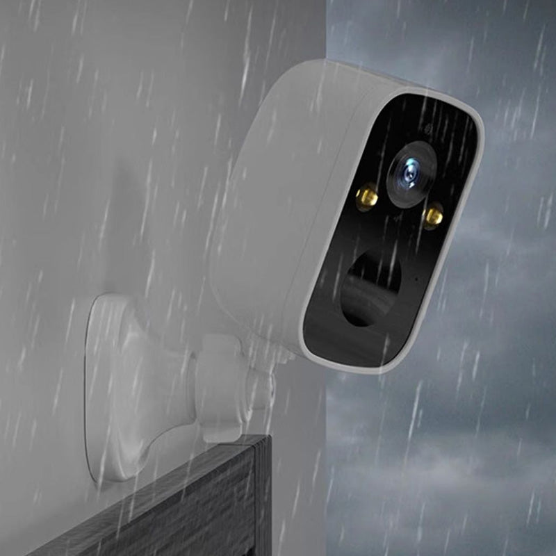 Smart Home Wireless Camera on a desk, near a laptop, demonstrating easy setup