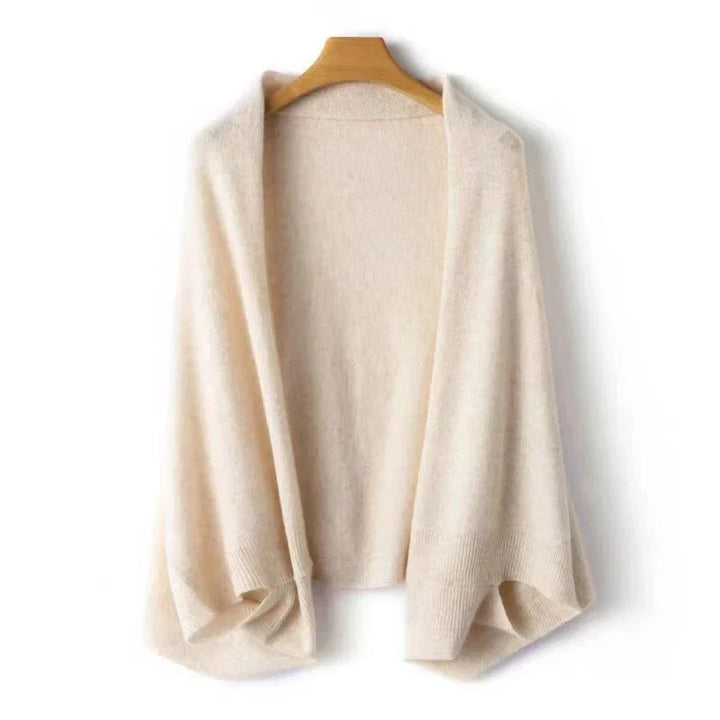Soft cream wool shawl wrap for women. Cozy, elegant accessory, perfect for warmth & style.