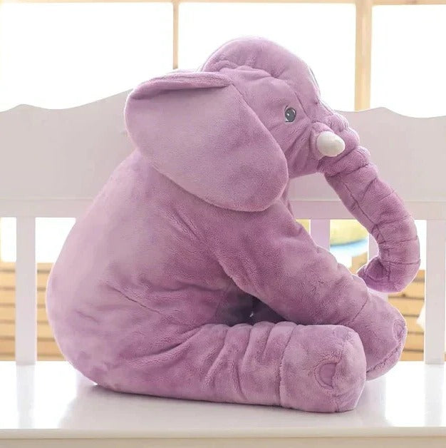 Adorable baby elephant stuffed animal, a soft cuddle pillow for kids, perfect for nursery decor.
