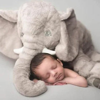 Gentle gray elephant cuddle pillow, a soft plush toy for babies, kids, and nursery comfort.