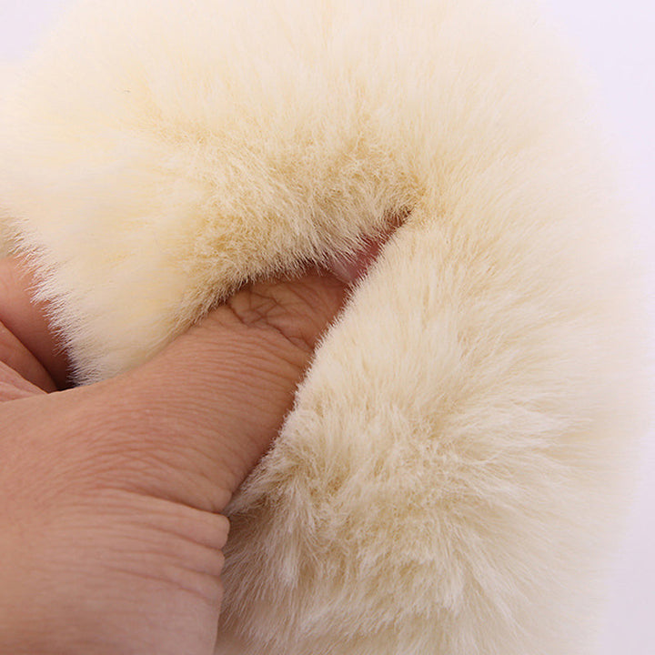 Close-up of a soft universal plush steering wheel cover texture for car interior