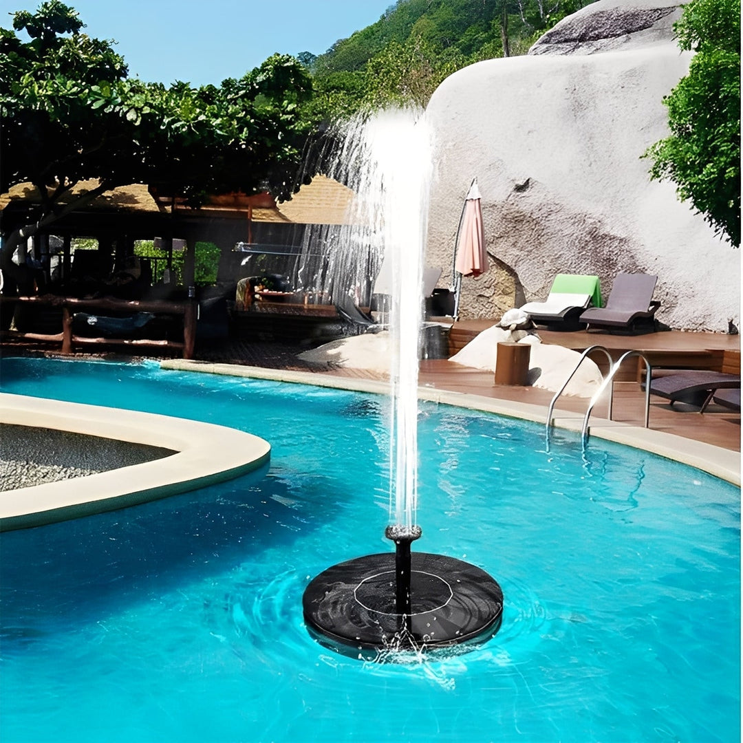 Solar floating fountain pump for bird bath or garden pond, an eco-friendly outdoor water feature.