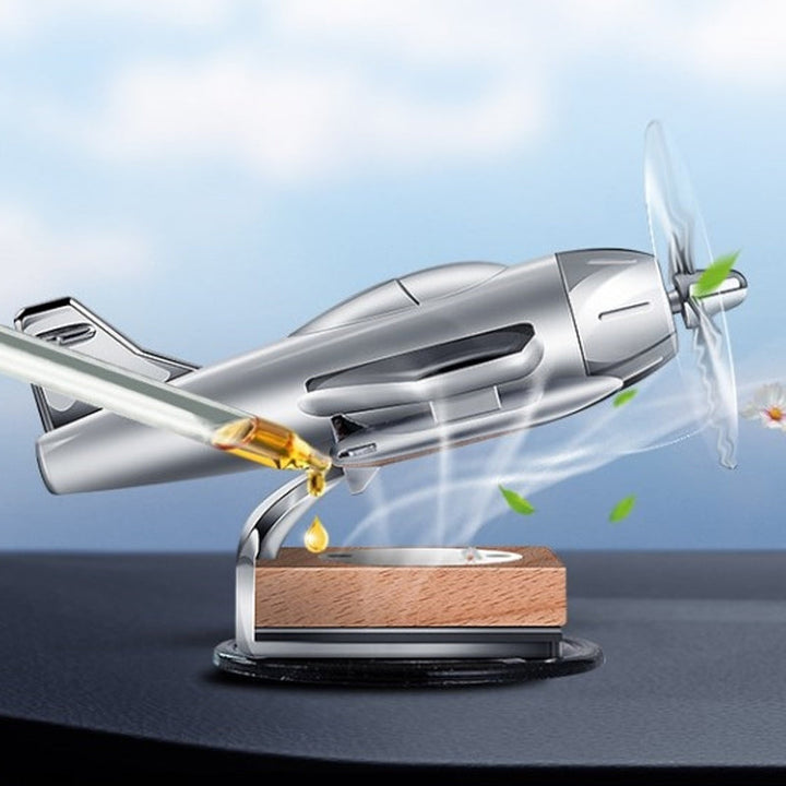 Solar-powered airplane car diffuser with rotating propeller, dual-function air freshener & car decoration