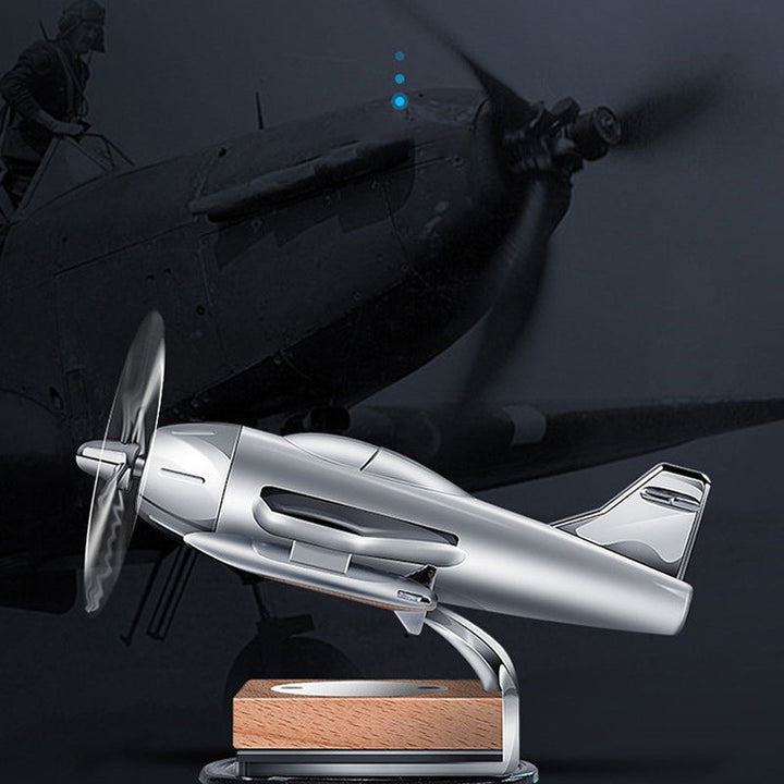 Car aromatherapy diffuser shaped like an airplane, solar-powered for continuous fresh scent