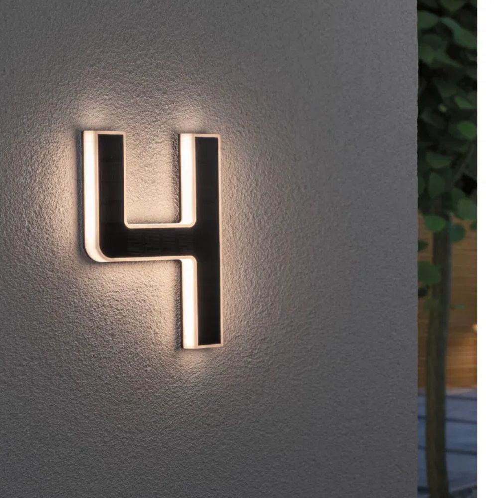 Outdoor LED house number with automatic solar charging for convenience.