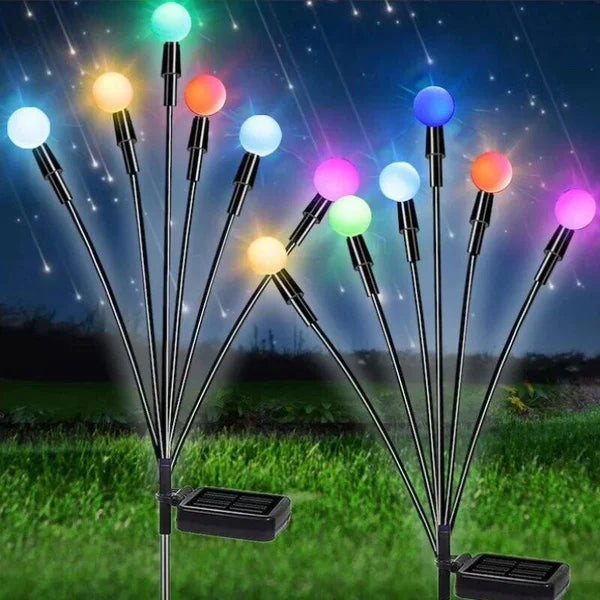 Detailed shot of the flexible stems and LED lights of a solar firefly garden light