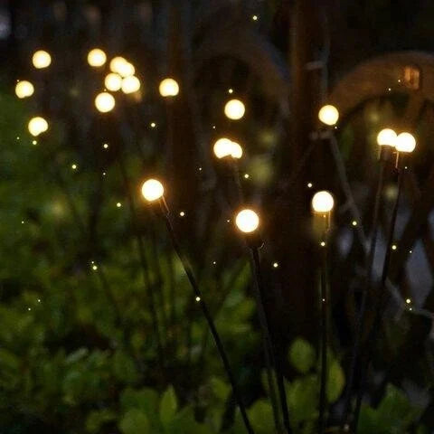 Top-down view of a solar panel integrated into an LED firefly garden light stake