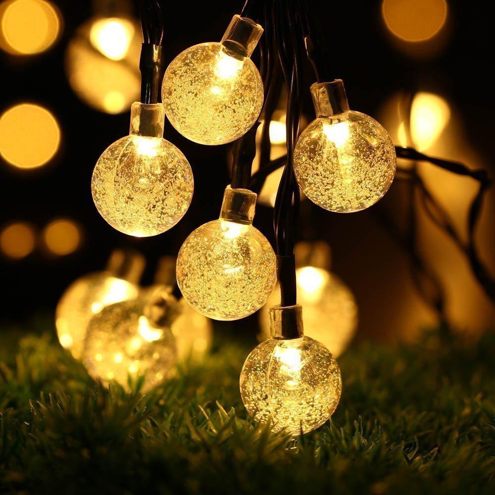 Solar powered patio lights with classic bulb design, elegant and durable for garden use