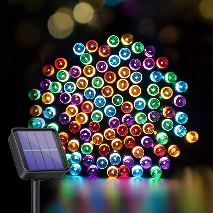 Solar powered string lights illuminating a patio, perfect for outdoor decor and evening ambiance
