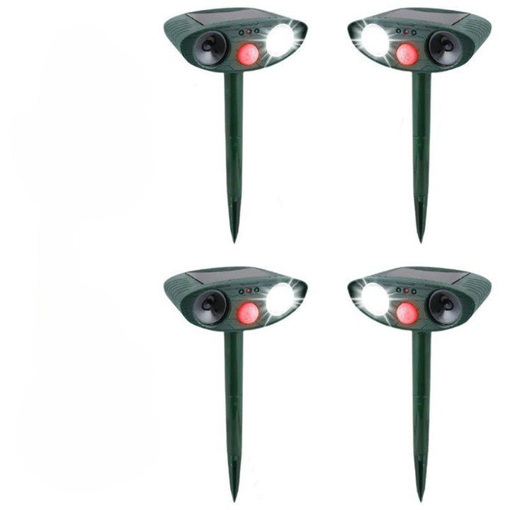 Solar-powered ultrasonic deer repeller 4-pack, humane wildlife deterrent for garden & yard protection.