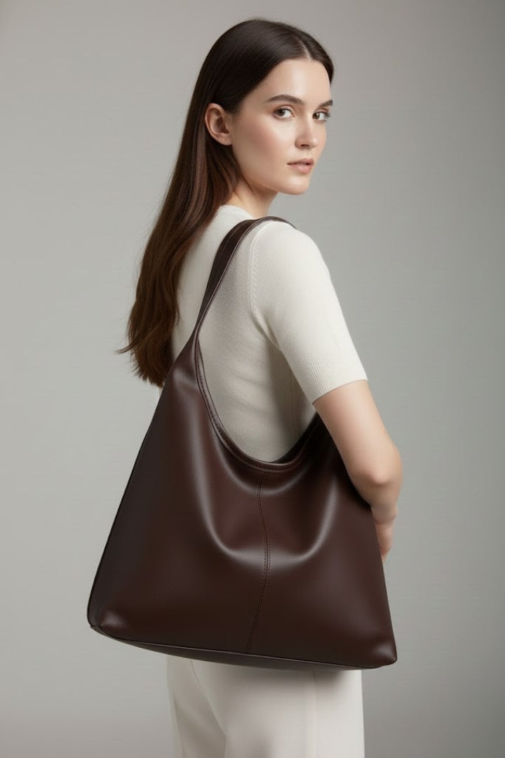Fashionable women's handbag, spacious interior for stylish daily carryall.