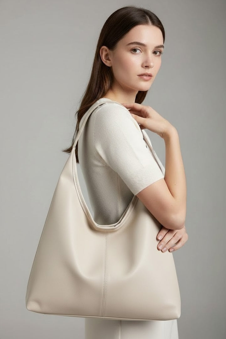 Versatile everyday women's bag, spacious interior, essential fashion accessory. Great as a shoulder bag.