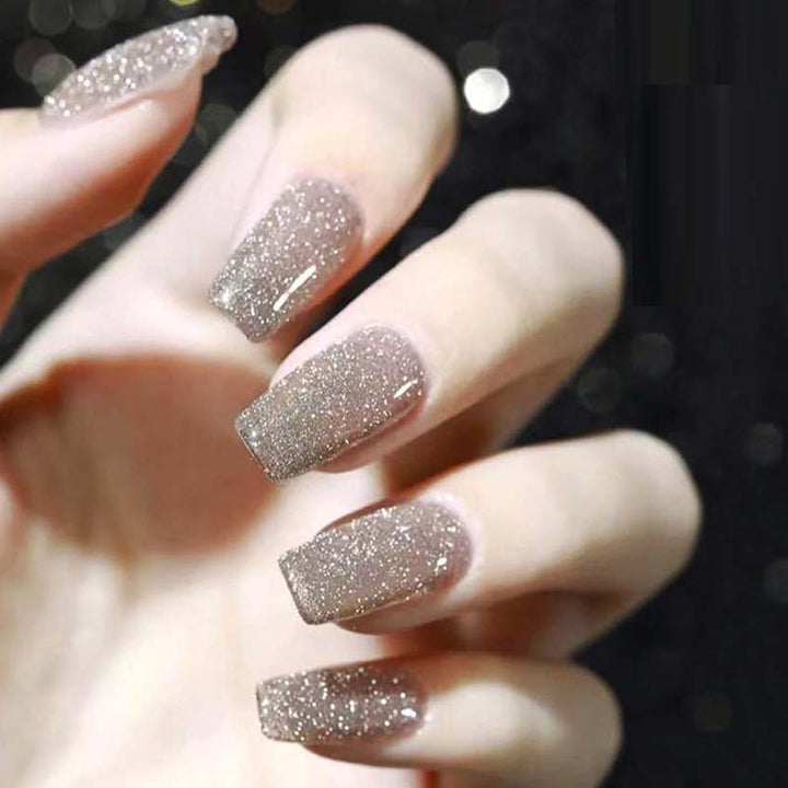 Swatches of various shades of sparkling glitter gel polish, for shimmering long-lasting beauty
