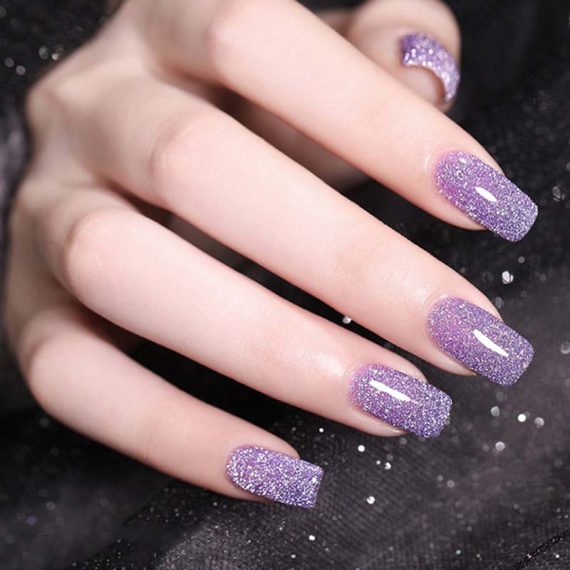 Shimmering nails created with sparkling glitter gel polish, a long-lasting UV LED manicure