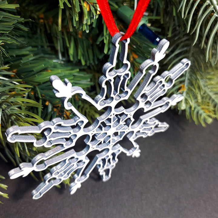 Festive snowflake Christmas ornament reflecting light, adds sparkle to home decor
