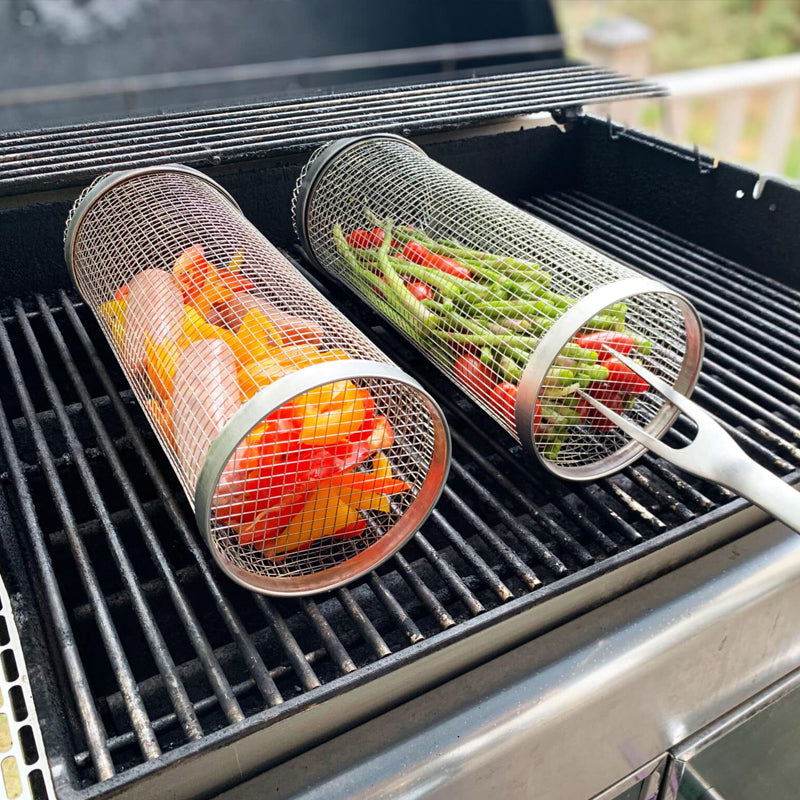 Rectangular stainless steel grill basket for evenly cooking vegetables and meats on the BBQ.