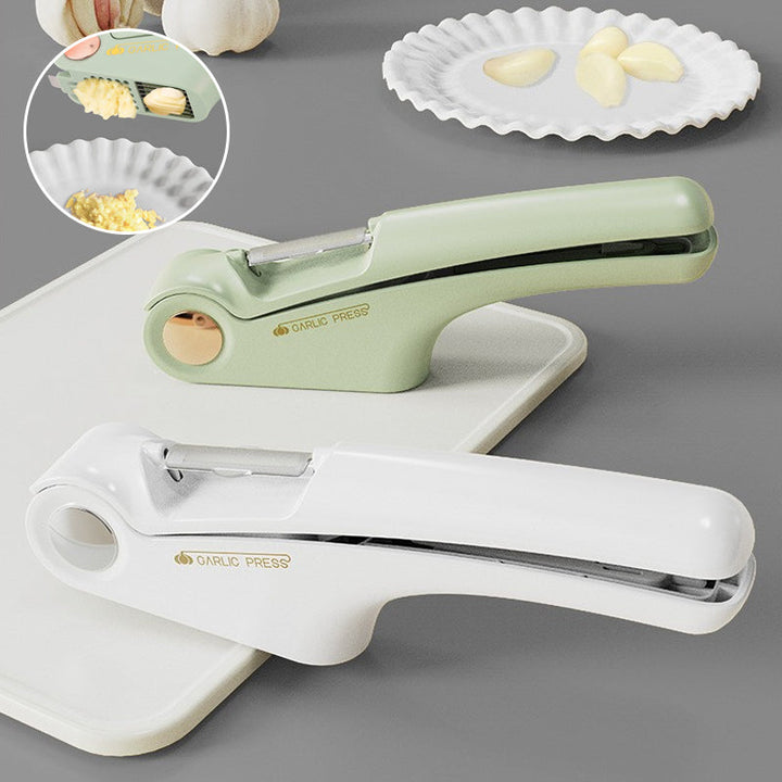 Stainless steel garlic press, durable kitchen gadget for easy food prep.